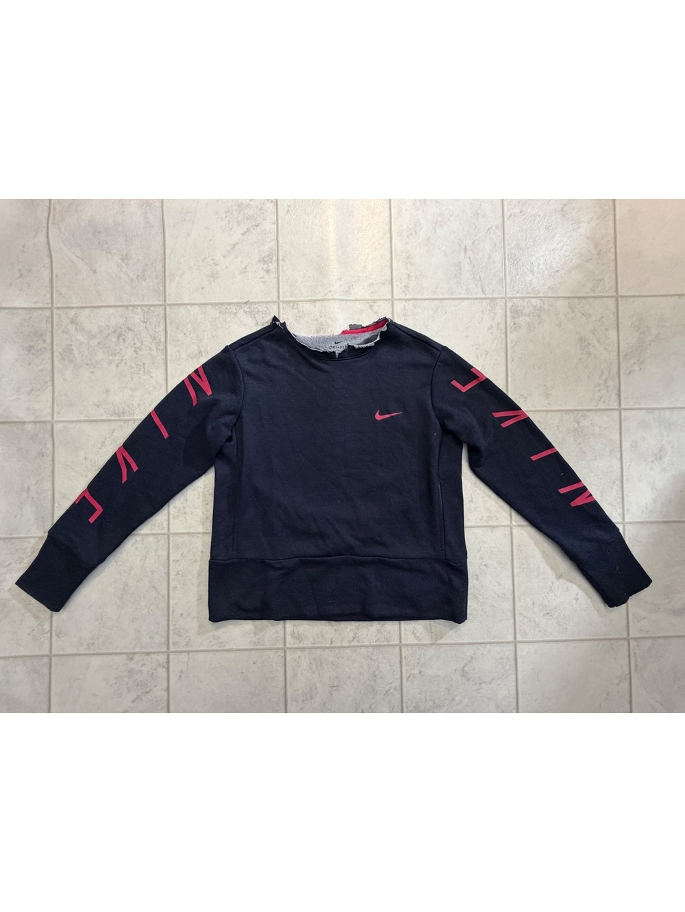 Nike Dri-FIT navy sweatshirt with pink graphics